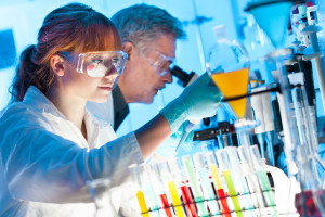 http://www.dreamstime.com/stock-photos-health-care-professionals-lab-attractive-young-female-scientist-her-senior-male-supervisor-looking-cell-colony-grown-image39541093